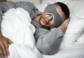 A man sleeping on a bed Royalty Free Stock Photo