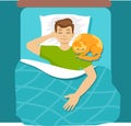 Man sleeping in bed with cat. Guy chilling at home with comfortable cat in relaxing position. Sleep, rest. Royalty Free Stock Photo
