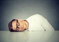 Man sleeping on a desk Royalty Free Stock Photo