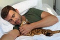 Man sleeping with his cat Royalty Free Stock Photo