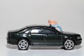 Man sleeping over the roof of a car Royalty Free Stock Photo