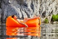 Man sleeping in a raft on the river