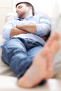 Man sleeping on sofa Royalty Free Stock Photo