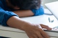 Man sleeping on table, laptop on table, man tired from work Royalty Free Stock Photo