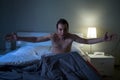 Man sleepless in his bed screaming after nightmare Royalty Free Stock Photo