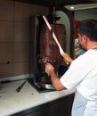 Man slicing doner kebab Royalty Free Stock Photo