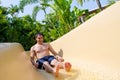 Man Sliding Down Water Slide. Royalty Free Stock Photo