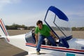 Man in small airplane