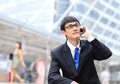 Man on smart phone - young business man. Casual urban profession Royalty Free Stock Photo