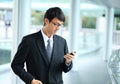 Man on smart phone - young business man. Casual urban profession Royalty Free Stock Photo