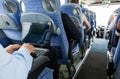 Man with smartphone and laptop in travel bus Royalty Free Stock Photo