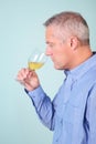 Man smelling a glass of white wine Royalty Free Stock Photo