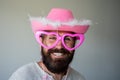 Man smile face and funny glasses feeling happy. Handsome smiling cowboy. Positive human facial expressions and emotions. Royalty Free Stock Photo