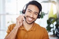 Man with smile in portrait, call center employee and contact us with headset and microphone, CRM and help desk agent Royalty Free Stock Photo