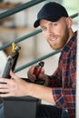 man smiles with holding tool box Royalty Free Stock Photo