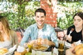 Man Smiling While Eating Unhealthful Food With Women Royalty Free Stock Photo