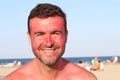 Man smiling while getting sunburned Royalty Free Stock Photo
