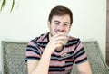 Man smiling holding glass of white wine Royalty Free Stock Photo