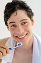 Man smiling and holding a toothbrush Royalty Free Stock Photo