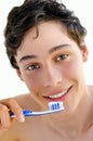 Man smiling and holding a toothbrush Royalty Free Stock Photo