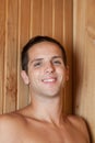 Man smiling inside the sauna Royalty Free Stock Photo