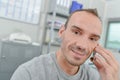 Man smiling while on phone Royalty Free Stock Photo