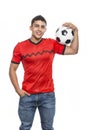 Man smiling with soccer ball in hands