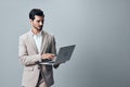 Man smiling stylish laptop suit freelancer computer copyspace job business internet