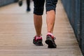 Man with sneakers running on a path, helathy activity to make exercice