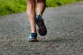 Man with sneakers running on a path, helathy activity to make exercice