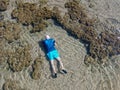 Man snorkeling in coral reef in tropical transparent sea Royalty Free Stock Photo