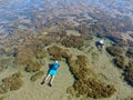 Man snorkeling in coral reef in tropical transparent sea Royalty Free Stock Photo