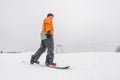 man snowboarding down by hill Royalty Free Stock Photo