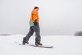 man snowboarding down by hill Royalty Free Stock Photo