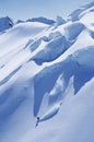 Man Snowboarding On Steep Slope