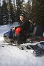 Man on snowmobile. Royalty Free Stock Photo