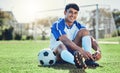 Man, soccer field and tie shoes for sports training, fitness games and performance on stadium ground. Portrait, athlete
