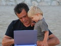 Man and son with computer