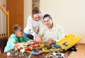 Man with son doing something with working tools Royalty Free Stock Photo