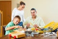 Man with son doing something with the working tools Royalty Free Stock Photo