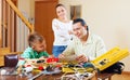 Man with son doing something with working tools Royalty Free Stock Photo