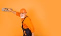 man with spatula. process of applying layer of putty. Plastering tools for plaster. plaster trowel spatula on yellow Royalty Free Stock Photo