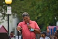 Man speaking at a local Juneteenth event