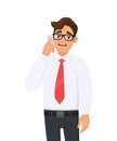 Man speaking or talking on the mobile, cell or smart phone. Male character wearing white formal shirt and red colour/color tie. Royalty Free Stock Photo