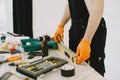 Plumber in uniform on white background