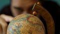 Man spinning a globe. Royalty Free Stock Photo