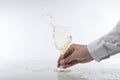 Man splashing white wine in a glass Royalty Free Stock Photo