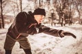 Man Taking Break From Running in Extreme Snow Conditions