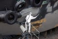 Man spray painting hood of ship Royalty Free Stock Photo