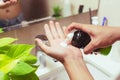 Man spraying shaving foam on the palm